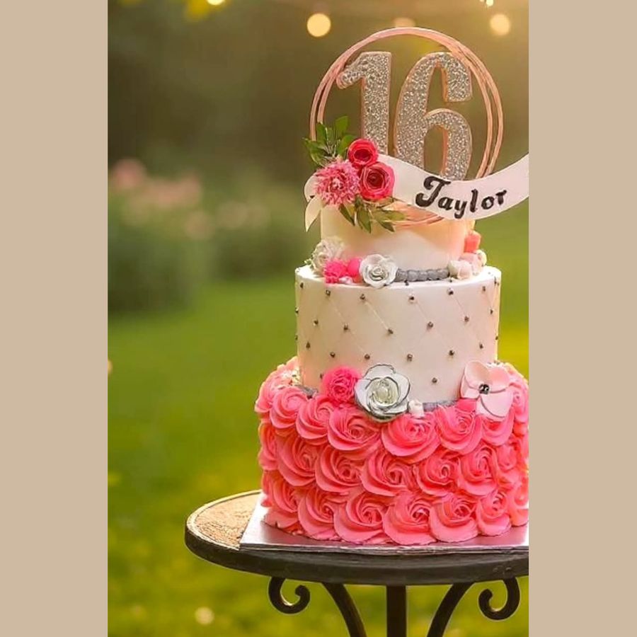 Three-tier sweet 16 cake with pink rosettes, quilting and a rhinestone 16 topper